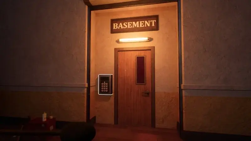 Door marked Basement with a keypad mounted on its left