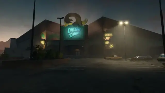 Daltons Dinos entrance sign above the roadside attraction and parking area