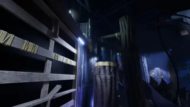 Raised stump landing and hanging pole beside an exhibit wall