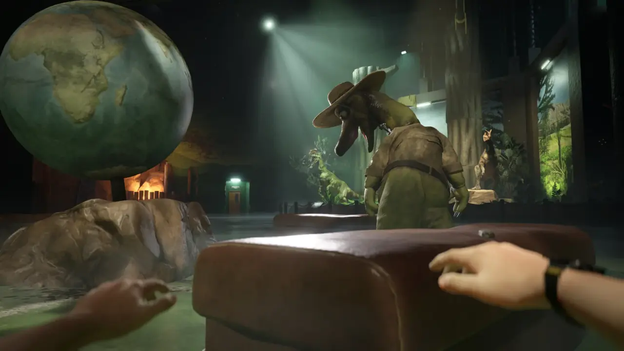 Globe beside dinosaur exhibit scenery in the Watering Hole