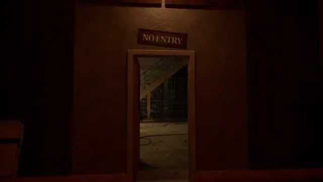 Open maintenance doorway beneath a No Entry sign