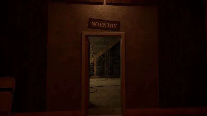 Open maintenance doorway beneath a No Entry sign