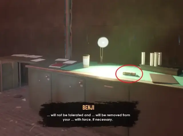 A cylindrical replacement fuse circled on an illuminated workbench.